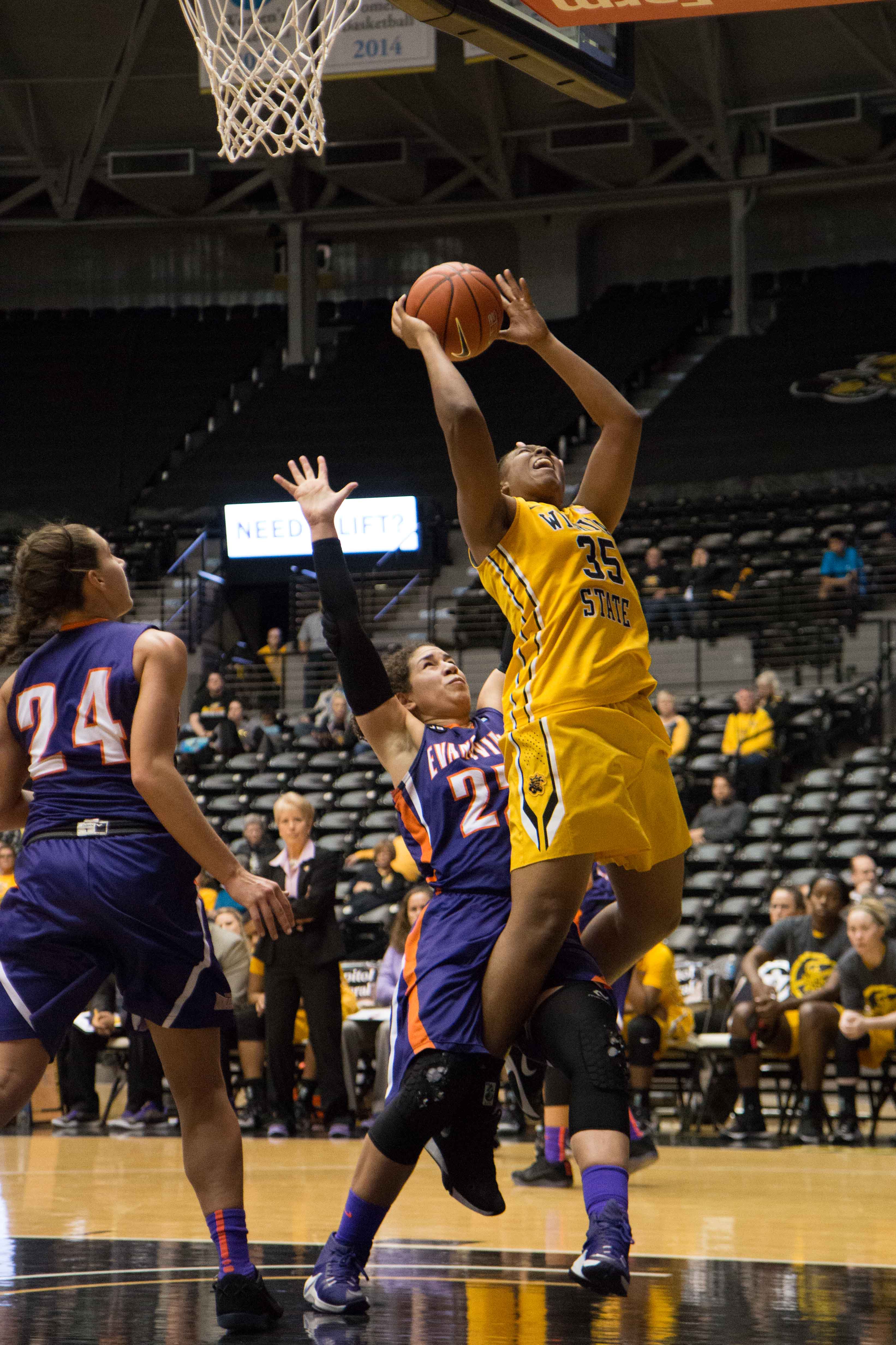 Wichita State forward Rangie Bessard leaps to score against Evansville. Bessard scored a total of 26 points throughout the game Friday night. (Feb. 10, 2017)