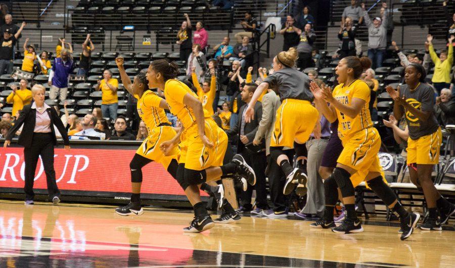 Shockers run onto the court to celebrate their victory against Evansville. The final score was 69-68. (Feb. 10, 2017)