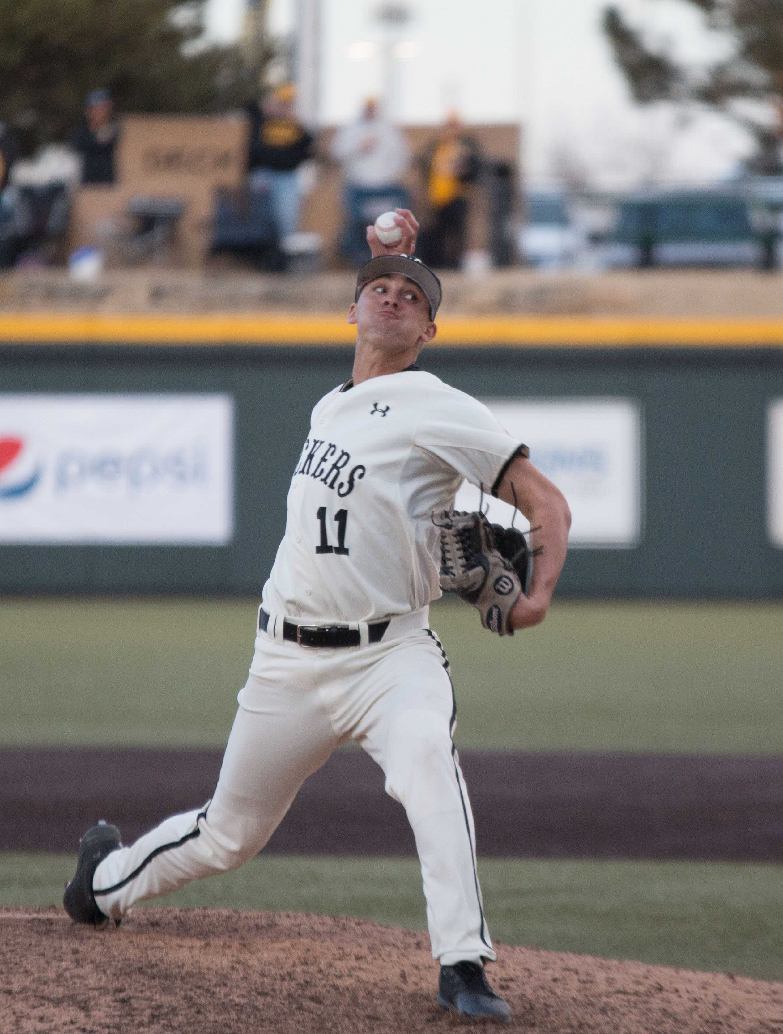 Wichita State's Ben Hecht winds up for a pitch during the game against Utah Valley. Hecht pitched during one inning of the game. (Feb. 17, 2017)