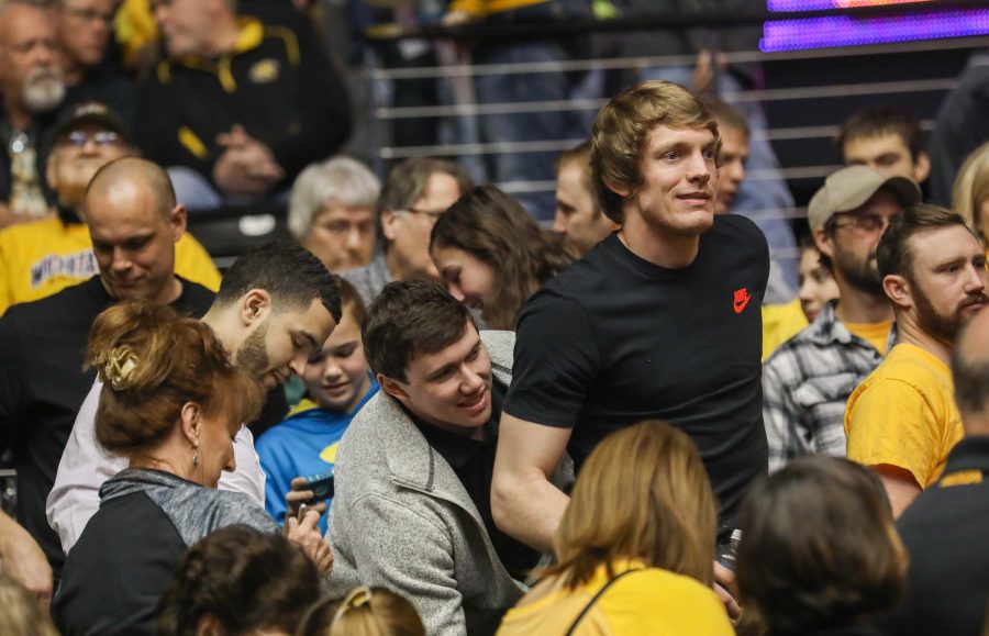 Former Wichita State players Ron Baker (right), Evan Wessel (center), and Fred Van Vleet (left) were in the stands for Wichita State’s match-up against Northern Iowa. Baker and Van Vleet are currently playing in the NBA. (Feb. 18, 2017)