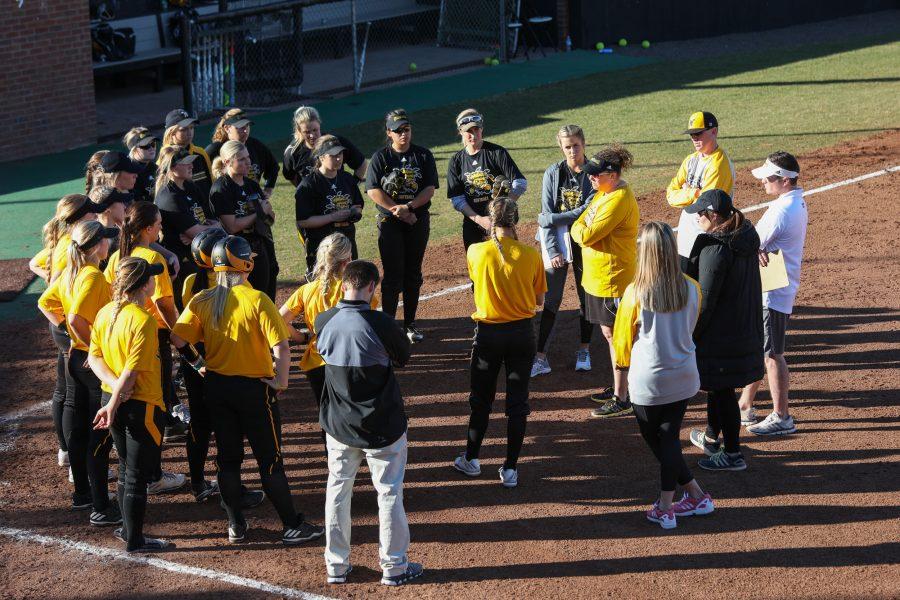 The Wichita State softball team meets together after practice Tuesday afternoon.