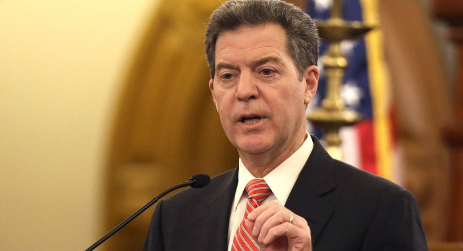 Gov.+Sam+Brownback+delivers+his+State+of+the+State+address+at+the+Kansas+Statehouse+in+Topeka%2C+Kan.%2C+Thursday%2C+Jan.+15%2C+2015.+%28AP+Photo%2FOrlin+Wagner%29
