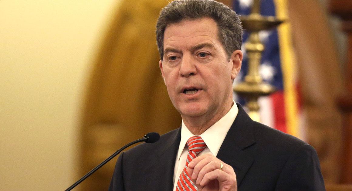 Gov. Sam Brownback delivers his State of the State address at the Kansas Statehouse in Topeka, Kan., Thursday, Jan. 15, 2015. (AP Photo/Orlin Wagner)