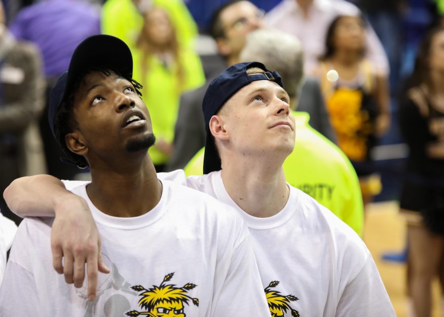 Zach Brown (left) and Zach Bush watch the One Shining Moment video. Senior Bush appeared to tear up.