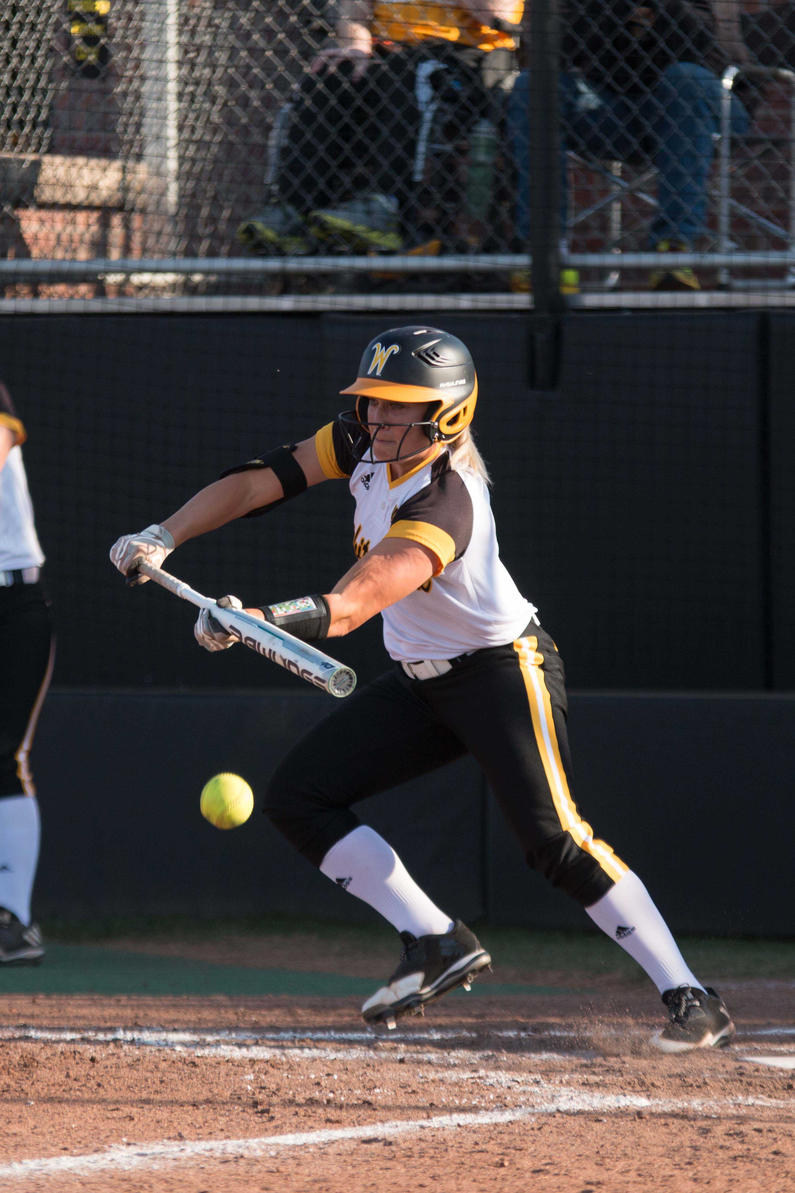 Junior McKenzie Adams bunts the ball against Nebraska. Wichita State overcame a 5-1 deficit by scoring five runs in the sixth inning to win 7-5.