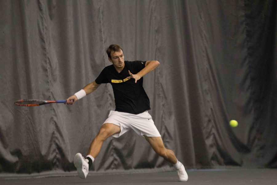 Junior Miroslav Herzan chases the ball to keep it from going out of bounds. Wichita State lost the match to Cornell. 