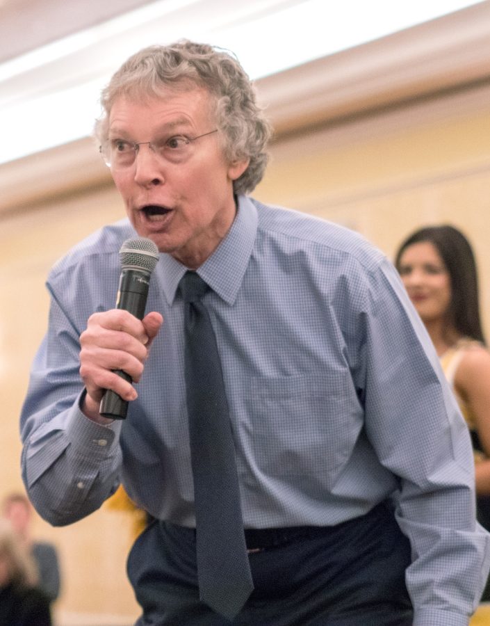 Dave Dahl pumps up the crowd with his speech at the pep rally in the Marriott St. Louis Grand before the Bradley game on March 3, 2017. Dahl is a broadcast for Wichita State.