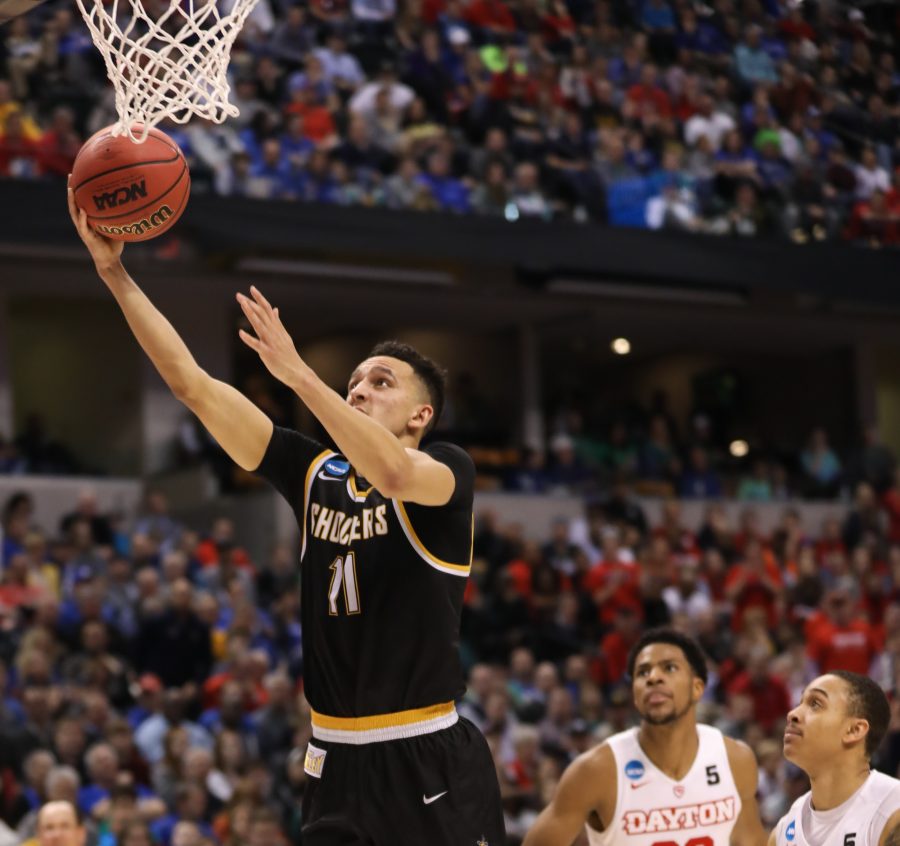 Wichita State’s Landry Shamet attempts a layup against Dayton in the second half at Bankers Life Fieldhouse in Indianapolis. The Shockers beat the Flyers 64 – 58 (Mar. 17, 17, 2017)