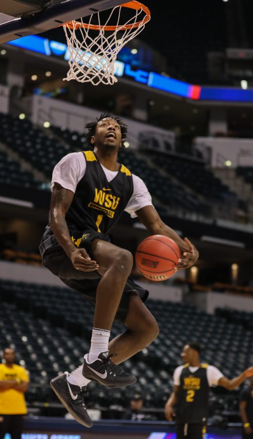 Wichita State forward Zach Brown dunks during open practice on Thursday afternoon in Bankers Life Fieldhouse in Indianapolis. Wichita State is set to play Dayton in the first round of the NCAA Tournament. (Mar. 16, 2017)