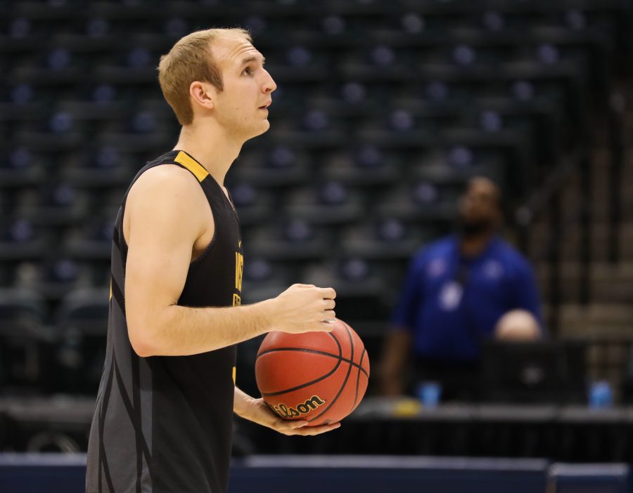 Wichita State guard Conner Frankamp practices shooting threes during the open practice in Bankers Life Fieldhouse in Indianapolis. The Shockers play Dayton in the first round of the NCAA Tournament. (Mar. 16, 2017)