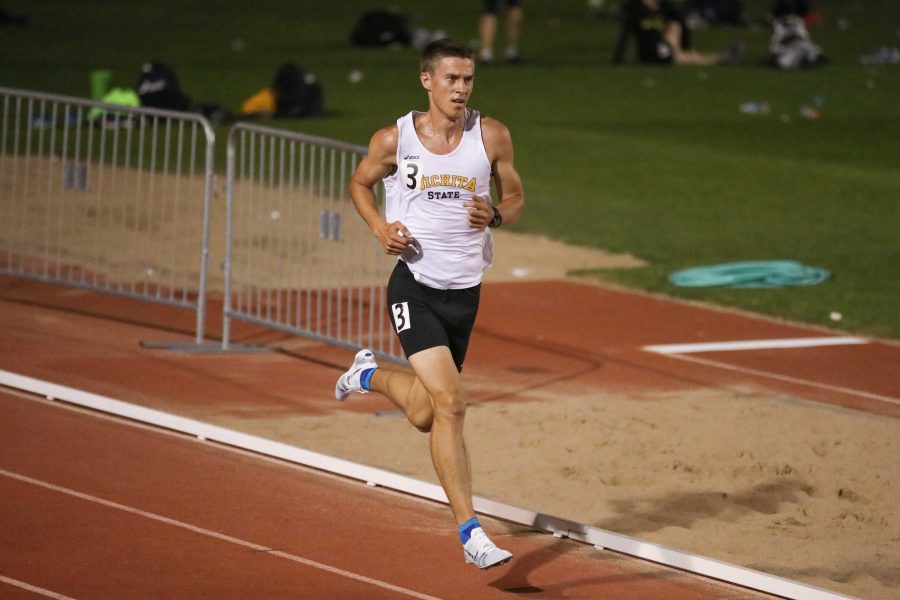 Senior+distance+runner+Ugis+Jocis+races+toward+the+finish+line+in+the+5%2C000+meter+run+at+the+KT+Woodman+Classic+on+Friday+night.+Jocis+won+the+race+and+claimed+his+U.S.+personal+record+with+a+time+of+14%3A35.55.+%28Apr.+14%2C+2017%29