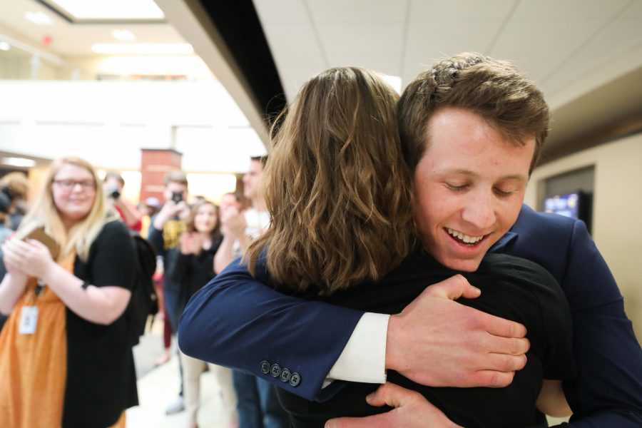 Vice President-elect Breck Towner hugs running mate Paige Hungate after the announcement of their victory in the RSC.