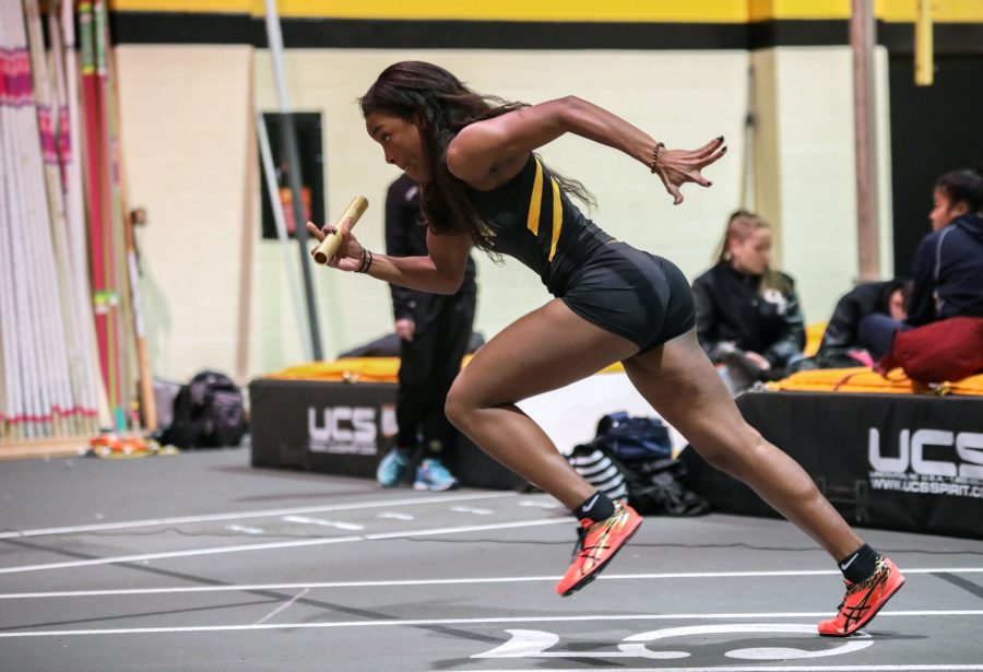 Daysha Bullocks leads off the Wichita State A squad in the 4 by 400 meter relay. Wichita State won the race.