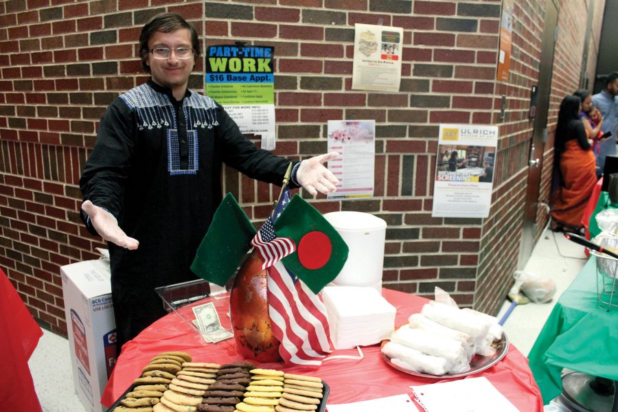 Wichita State junior Zaki Kaddoura serves up some fresh gyros at a pop up stand at Bengali New Year in Hubbard Hall.