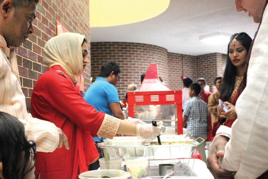 Members of the Bengali community gather to sell home cooked food for the New Year. Bengali in Hubbard Hall. New Year took place on April 14th.