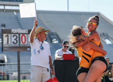Alesa Frey hugs teammate Emily Gardiner after pole vaulting a personal record of 13 feet 3.75 inches Friday at the Missouri Valley Conference Outdoor Track and Field Championship. Frey won the event. (May 12, 2017)