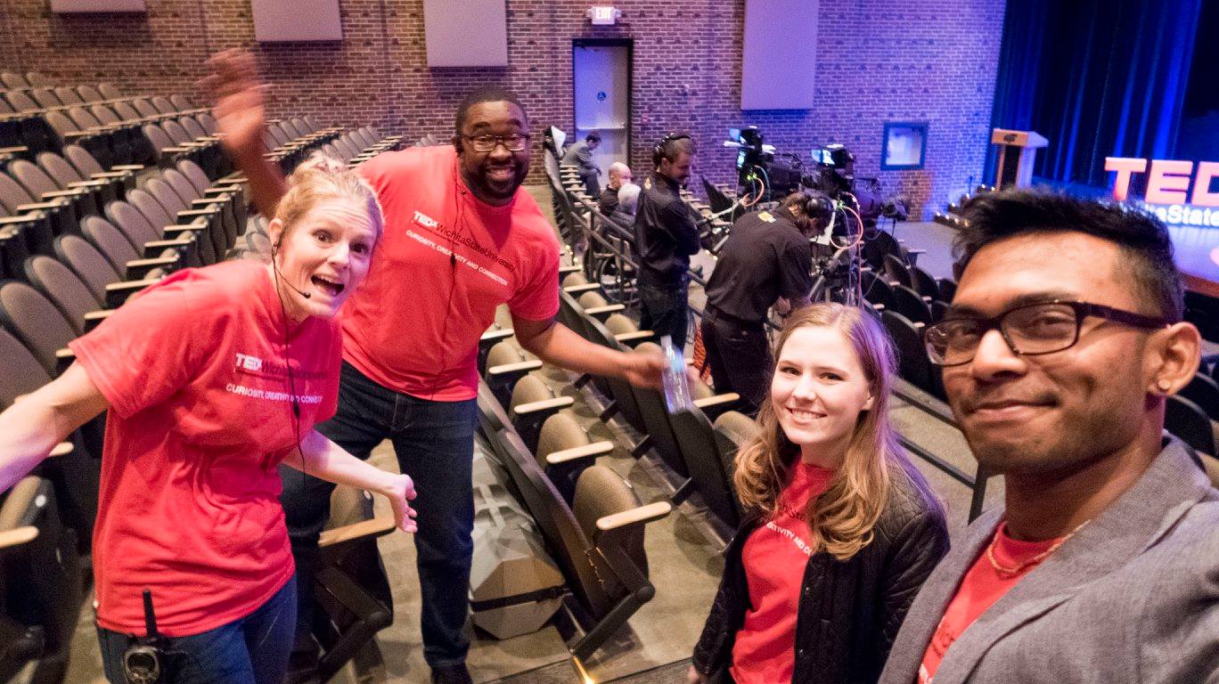 Lyston Skerritt, second from the left, poses for a photo with students and faculty before a TED Talk event on campus. Skerritt said helping students organize the event was one of his favorite memories at Wichita State.