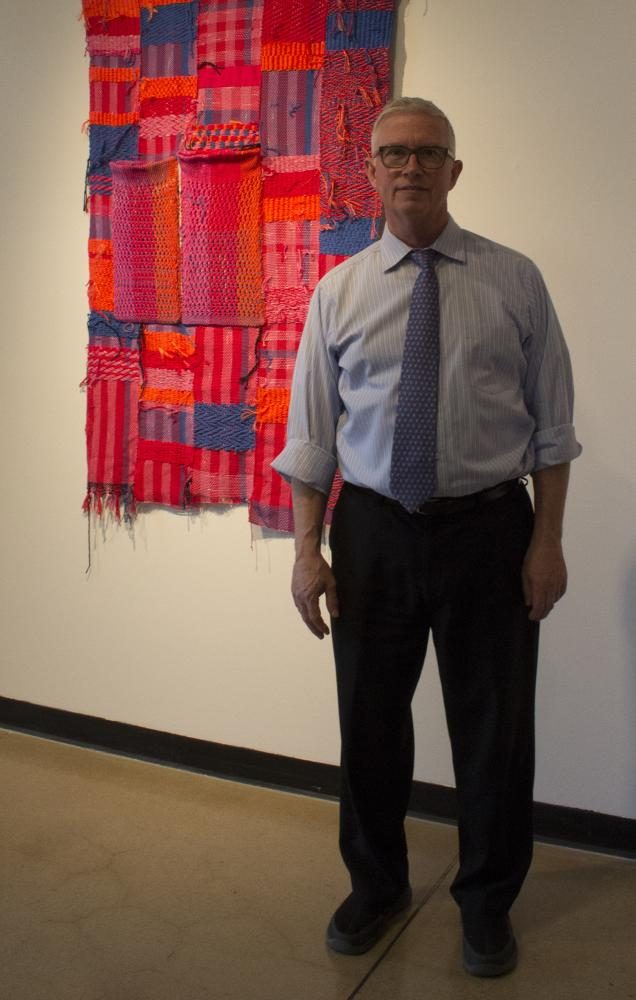 Bob Workman, Director of the Ulrich Museum, poses for a photo in the Ulrich Museum.