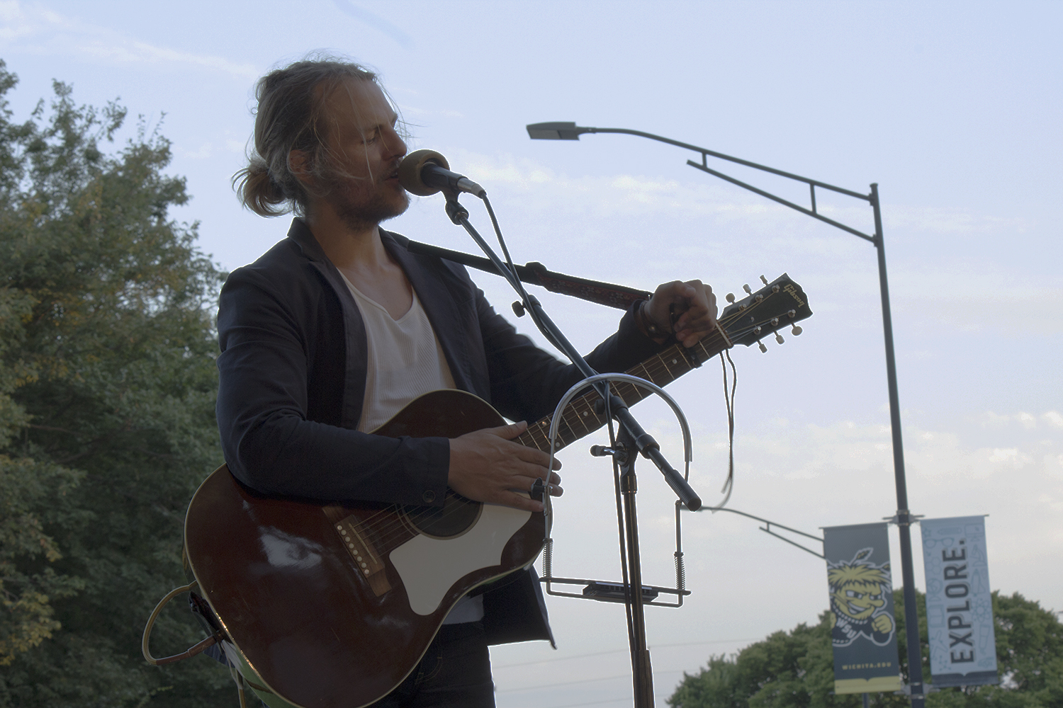 Charlie Mars, playing guitar and singing at Ulrich Museum.