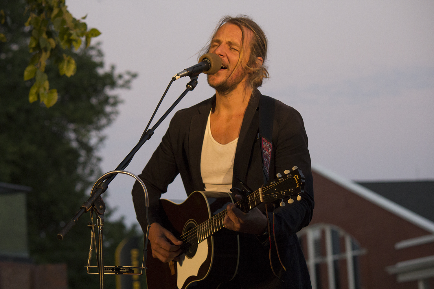Charlie Mars, playing guitar and singing at Ulrich Museum.
