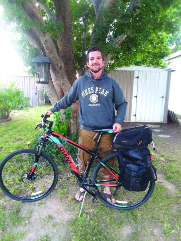 Hidle with his bike (courtesy).