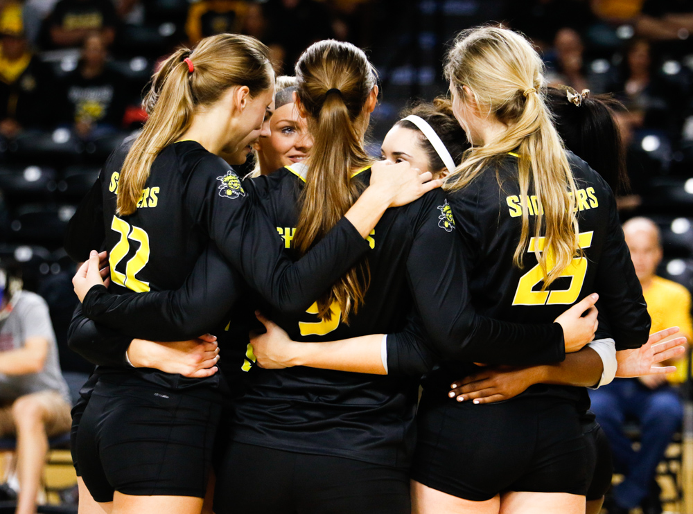 Wichita State Volleyball collects themselves after winning a point against Iowa State on Sunday afternoon at Koch Arena. (Sept. 17, 2017)