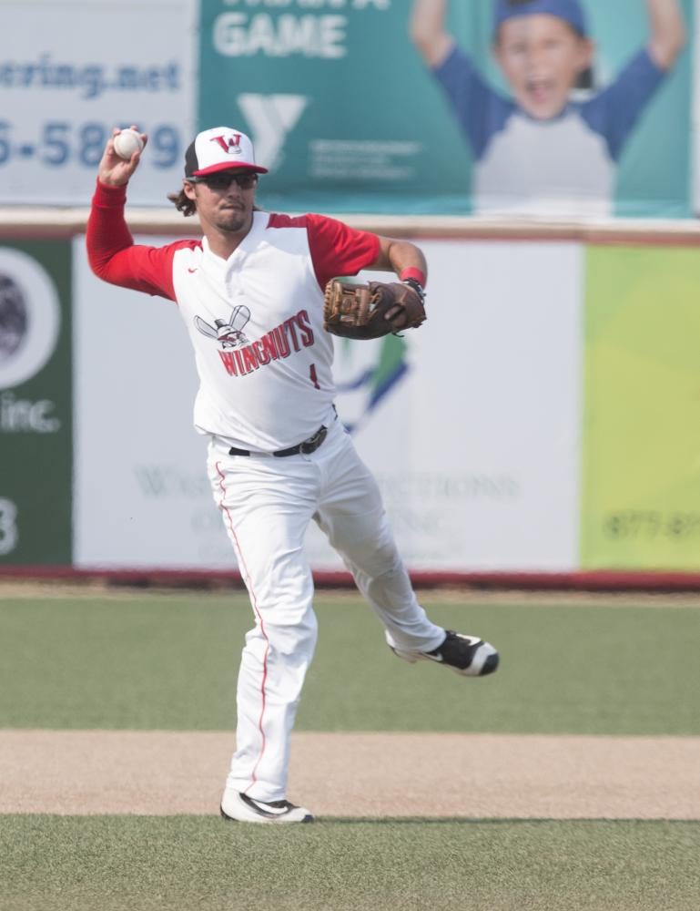 Wichita Wingnuts player Wesley Phillips  fields the ball during the game against the Salina Stockades. Phillips played baseball at Wichita State in 2014 before transferring to another university. 
