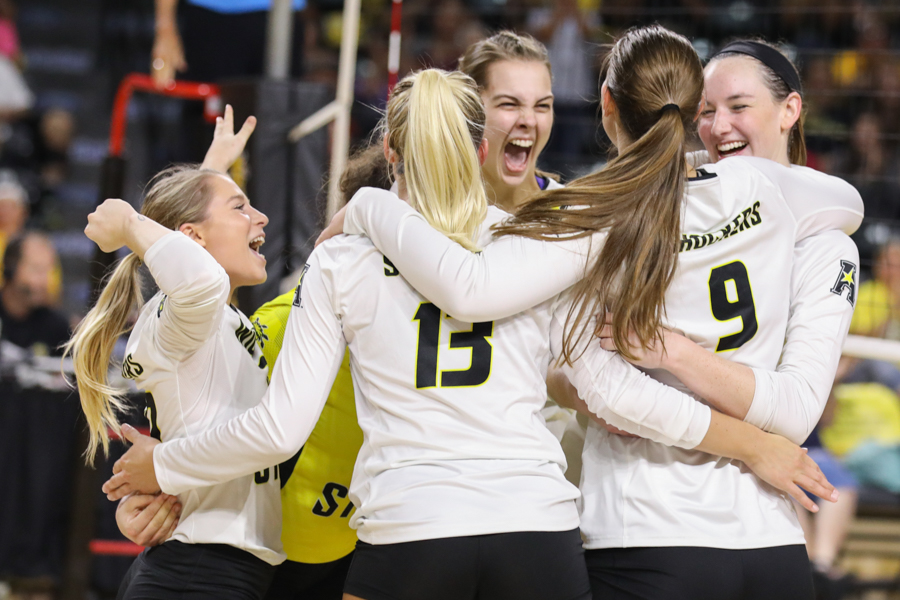 The Wichita State Volleyball team celebrates after a point during their defeat of Creighton. (Sept. 15, 2017)
