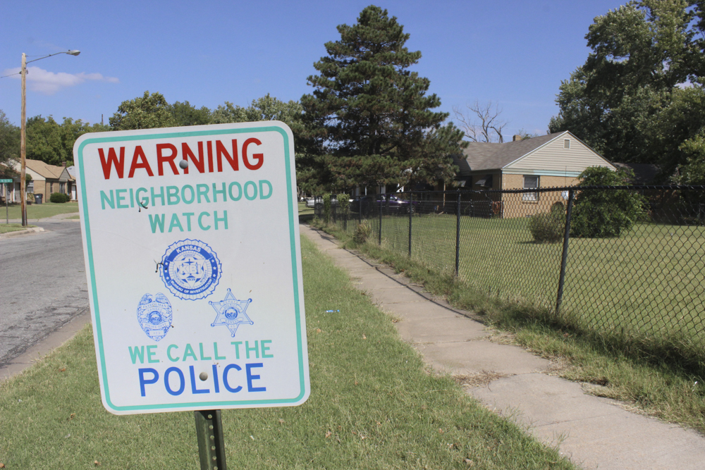 A sign stands in the Fairmont neighborhood where a drive-by was reported Tuesday. 