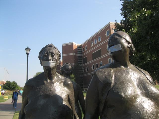 Tres Mujeres Caminando, a statue of three women located outside the Rhatigan Student Center, across from Grace Memorial Chapel, were discovered to have duct tape on the mouths. Ulrich Museum of Art preparators removed the duct tape Thursday morning.