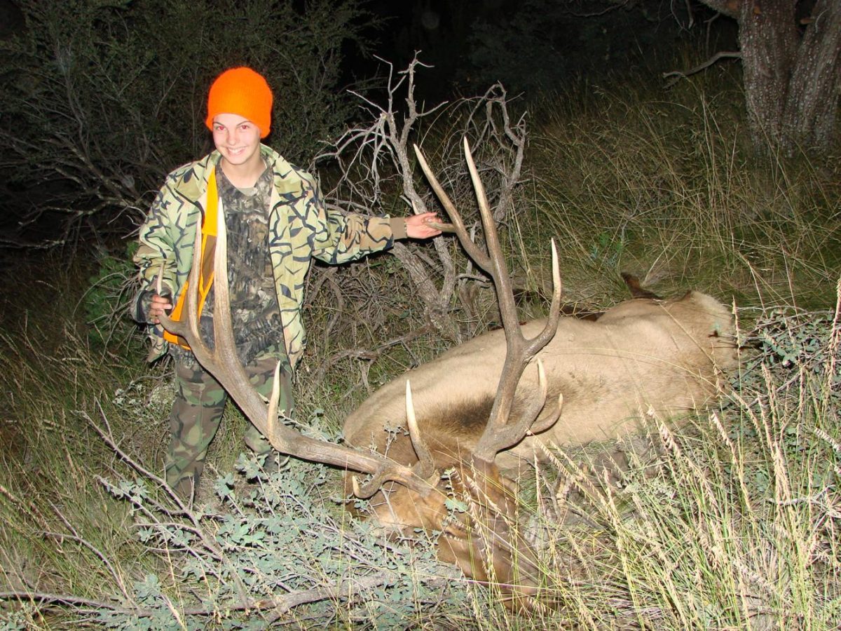 Mikaela Raudsepp holds an elk she killed in New Mexico.