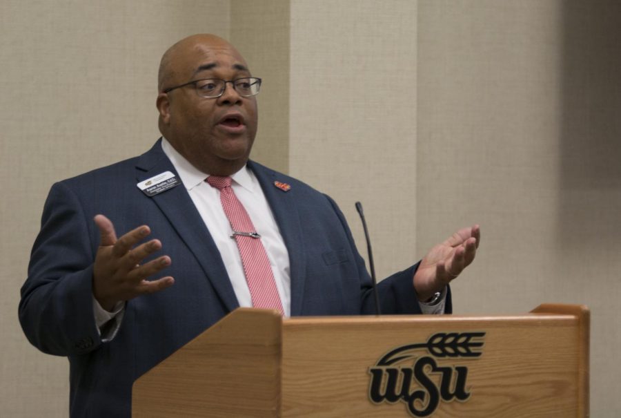 Associate Vice President for Student Affairs, Aaron Austin, speaks during the public forum portion of SGA. 