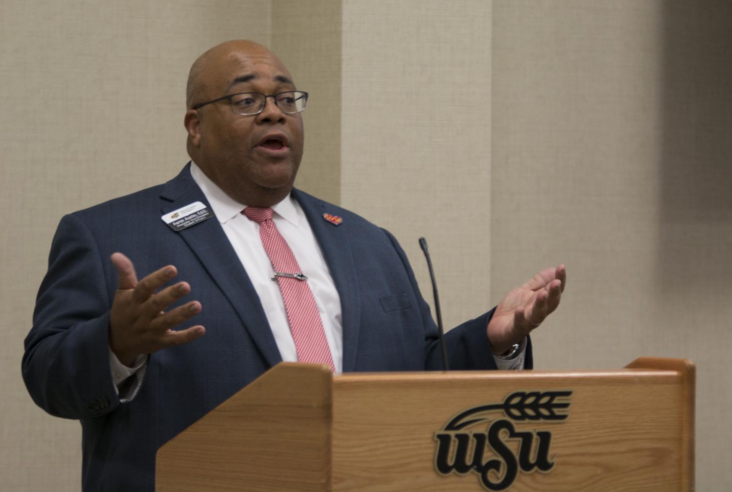 Associate Vice President for Student Affairs, Aaron Austin, speaks during the public forum portion of SGA.
