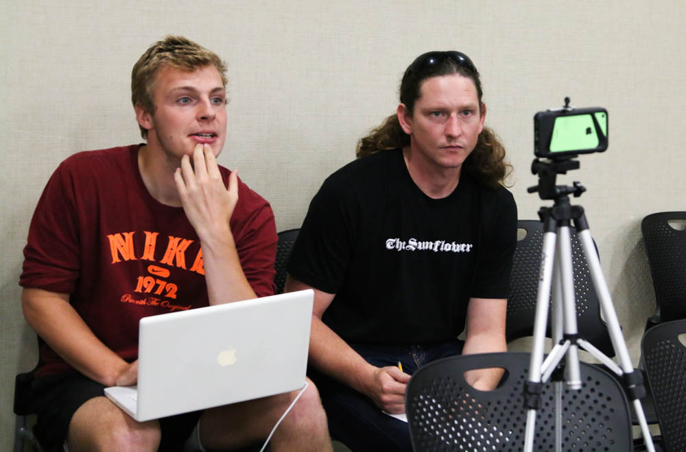Sunflower reporter Ray Strunk and editor Chance Swaim set-up a facebook live stream of the SGA meeting that took place Oct. 4.