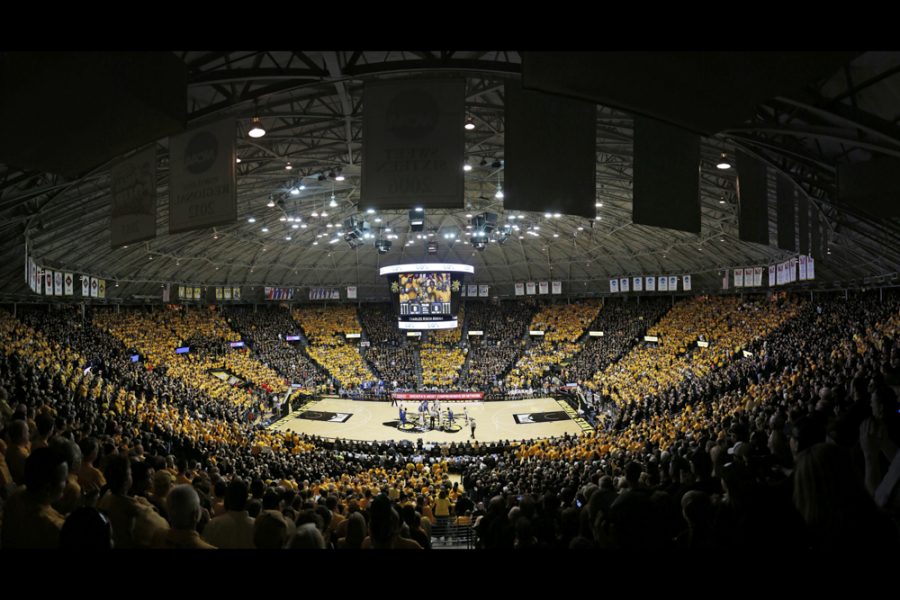 The arena shot was a game against Indiana State, on January 16, 2014. Each section wore the same color. I remember shooting the photo, which is actually nine photos stitched together in Photoshop and thinking how awesome it was to see the arena that way