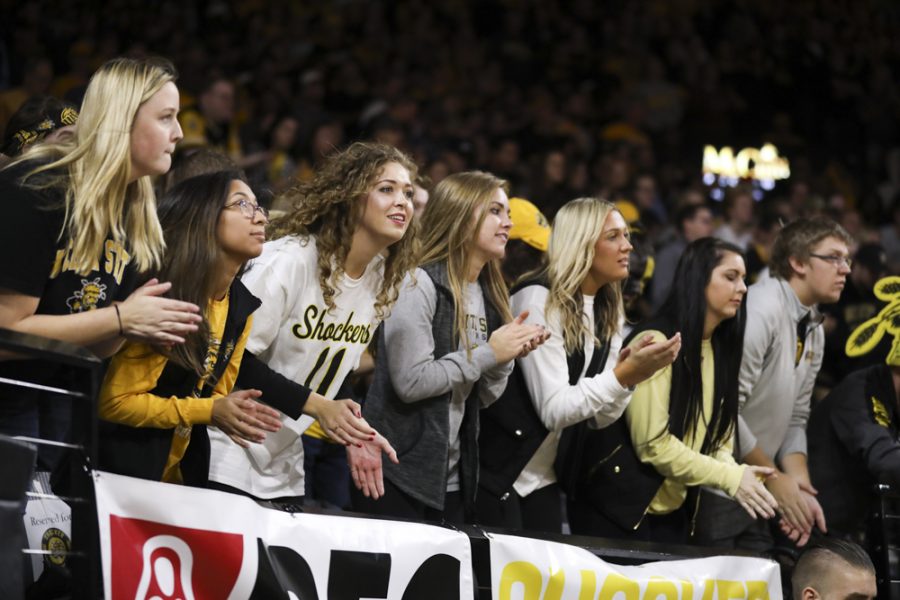 Wichita State Shockers fans cheers as the team enter the area at the start of the game against College of Charleston in Koch arena.