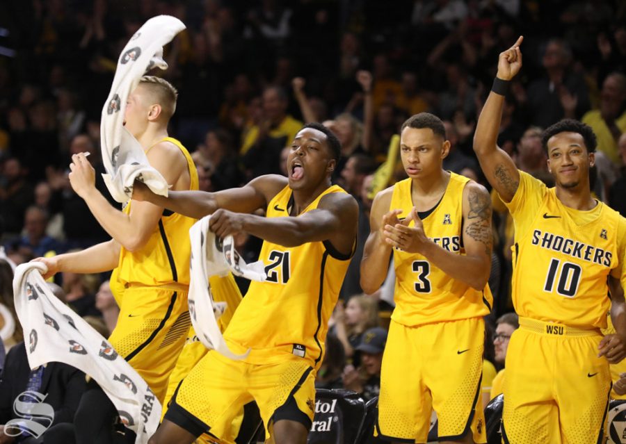 The Wichita State bench reacts to a shot during the Shockers game against Savannah State in Koch Arena.