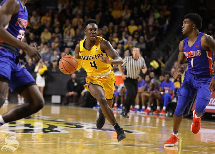 Wichita State guard Samajae Haynes-Jones drives through traffic against Savannah State in Koch Arena.