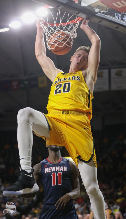 Wichita State Shockers center Rauno Nurger makes a dunk against Newman during the charity exhibition game in Koch Arena.