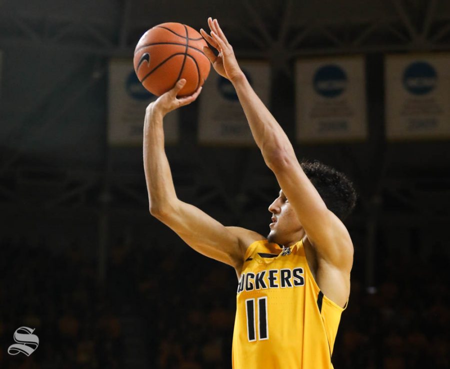 Wichita State guard Landry Shamet hits a three point basket against the Arkansas State Red Wolves during the first half in Koch arena