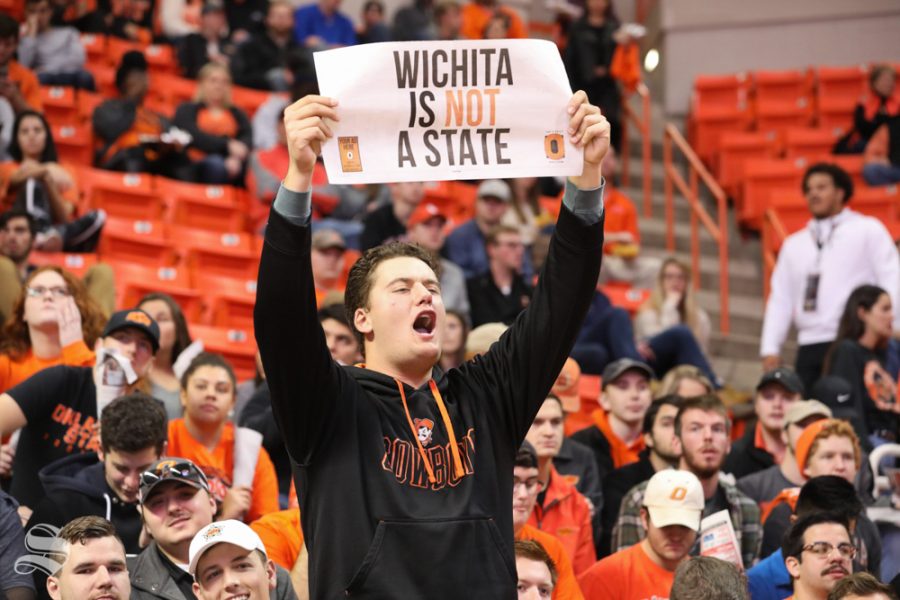 An Oklahoma State Cowboy fan holds up a sign before Wichita State tips off against Oklahoma State Cowboys in Gallagher-Iba Arena on Saturday.