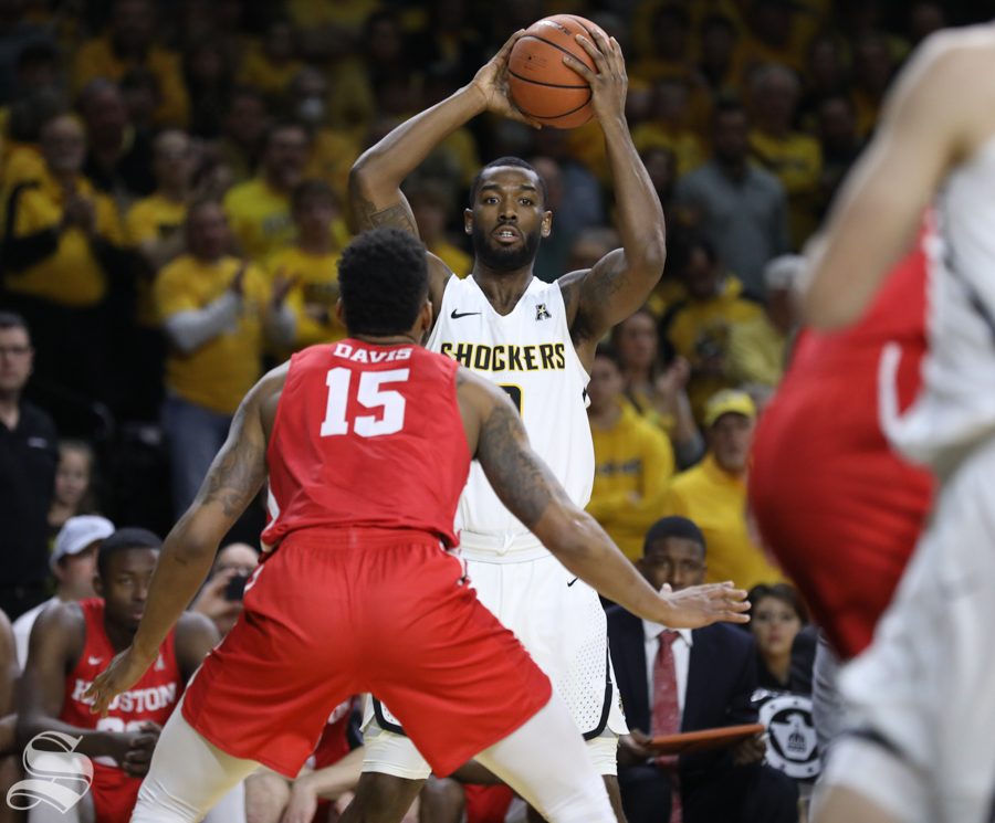 Wichita State forward Rashard Kelly looks for a pass against the Houston Cougars Thursday in Koch Arena.