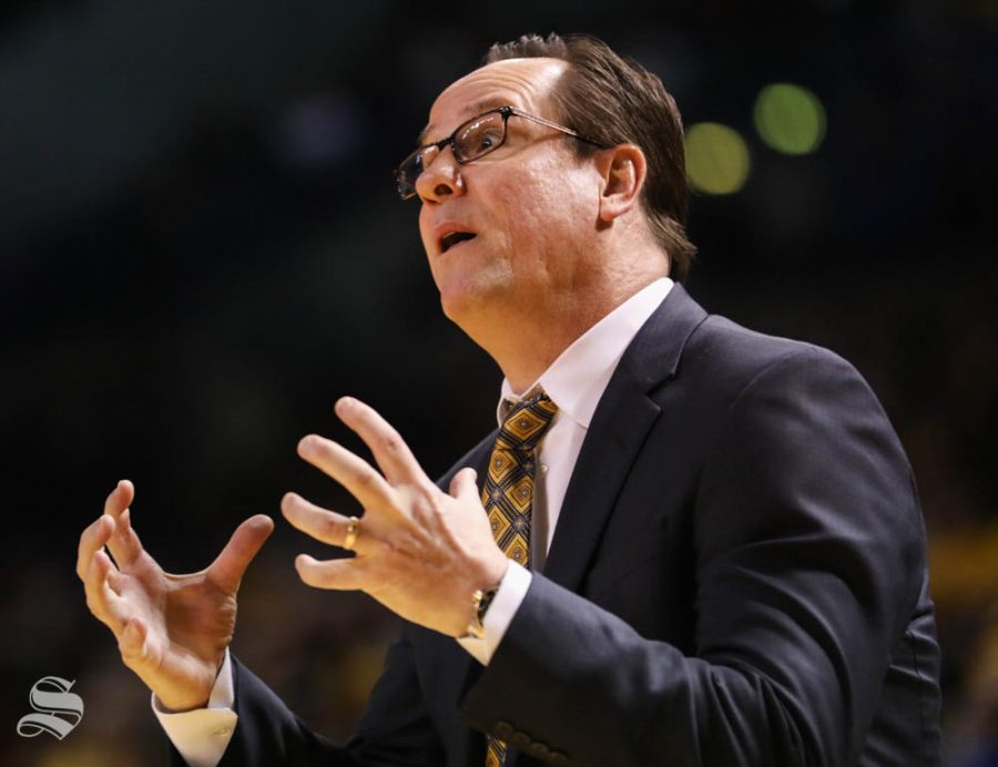 Wichita State head coach Gregg Marshall instructs Wichita State forward Markis McDuffie to keep his hands on the ball during the second half against the Tulsa Golden Hurricane in Reynolds Center.