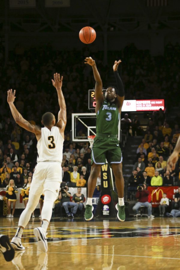 Tulane guard Ray Ona Embo shoots over Wichita State guard C.J. Keyser during the second half at Koch Arena.