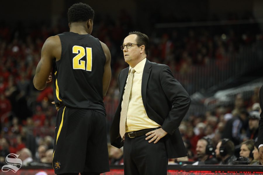 Wichita State head coach Gregg Marshall talks with Darral Willis Jr. Sunday against Cincinnati.