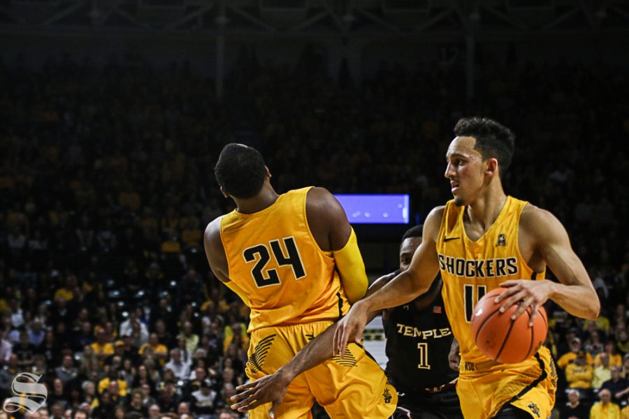 Wichita State guard Landry Shamet comes off a screen set by Shaquille Morris during the first half at Koch Arena.