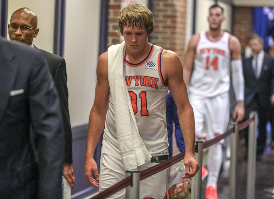 New York Knick shooting guard Ron Baker walks to the locker room after loosing to the Oklahoma City Thunder in their season opener.