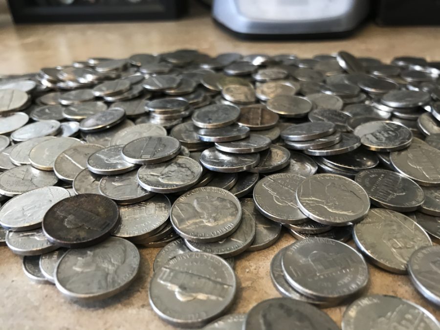 598+nickels+and+2+Canadian+nickels+used+to+pay+for+a+parking+ticket.