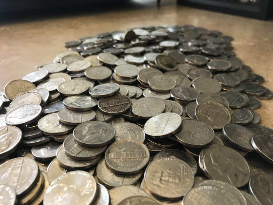 598 nickels and 2 Canadian nickels used to pay for a parking ticket.