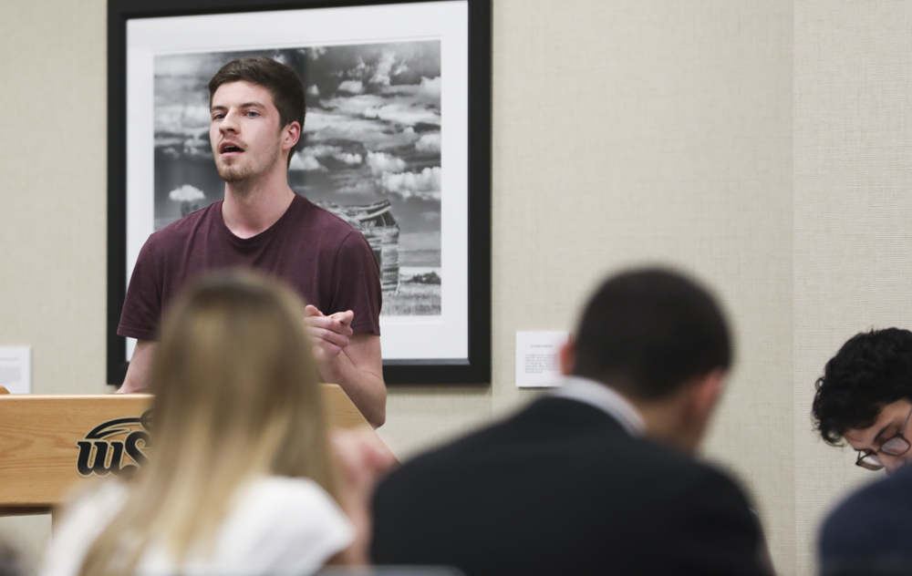 Ryan Lynch, captain of BAJA SAE, talks about the impact a cut to the funding would have on the club during the SGA meeting.